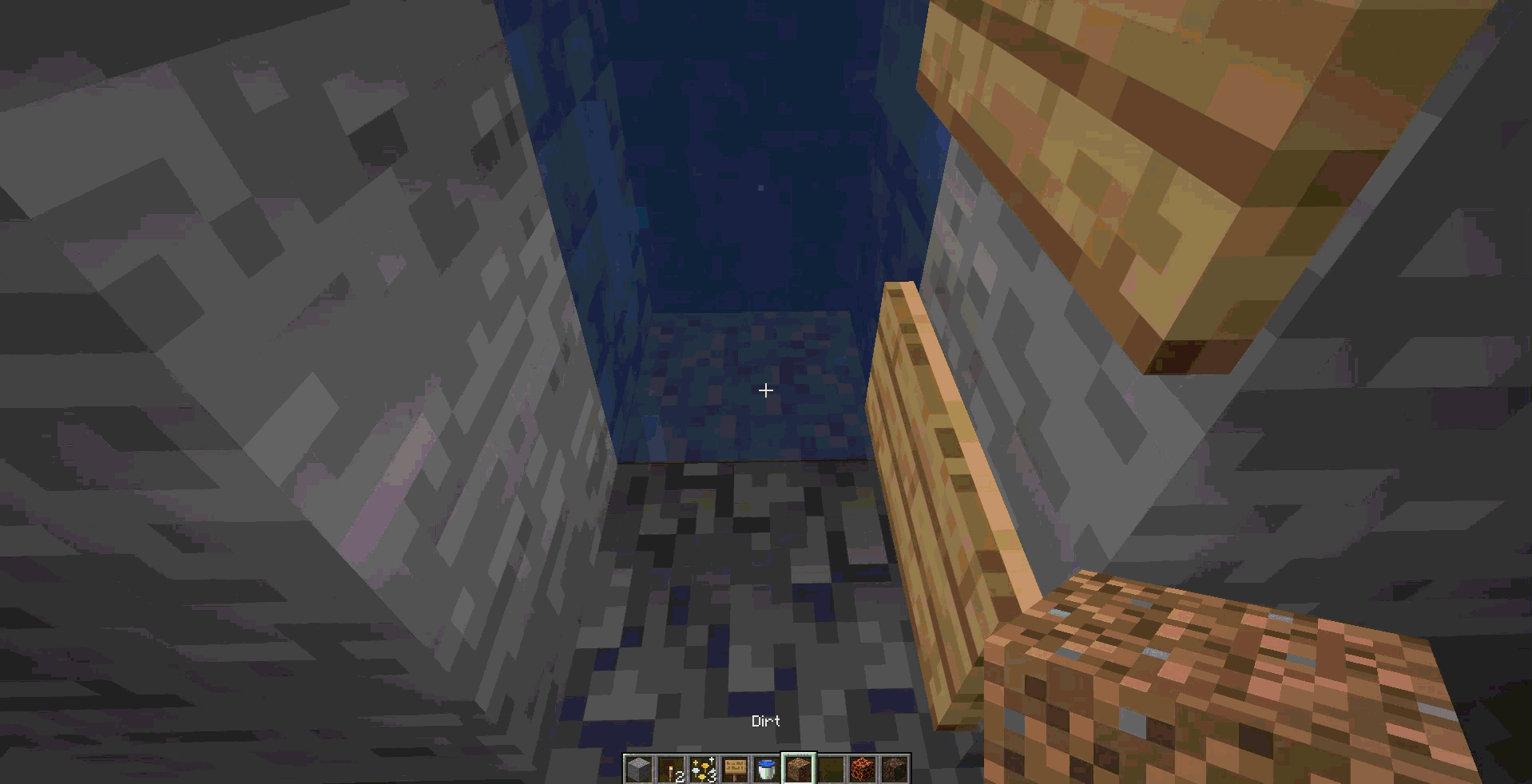 For a downward elevator, place a magma block. The bubbles will start moving down, quickly pulling you to the bottom level.
