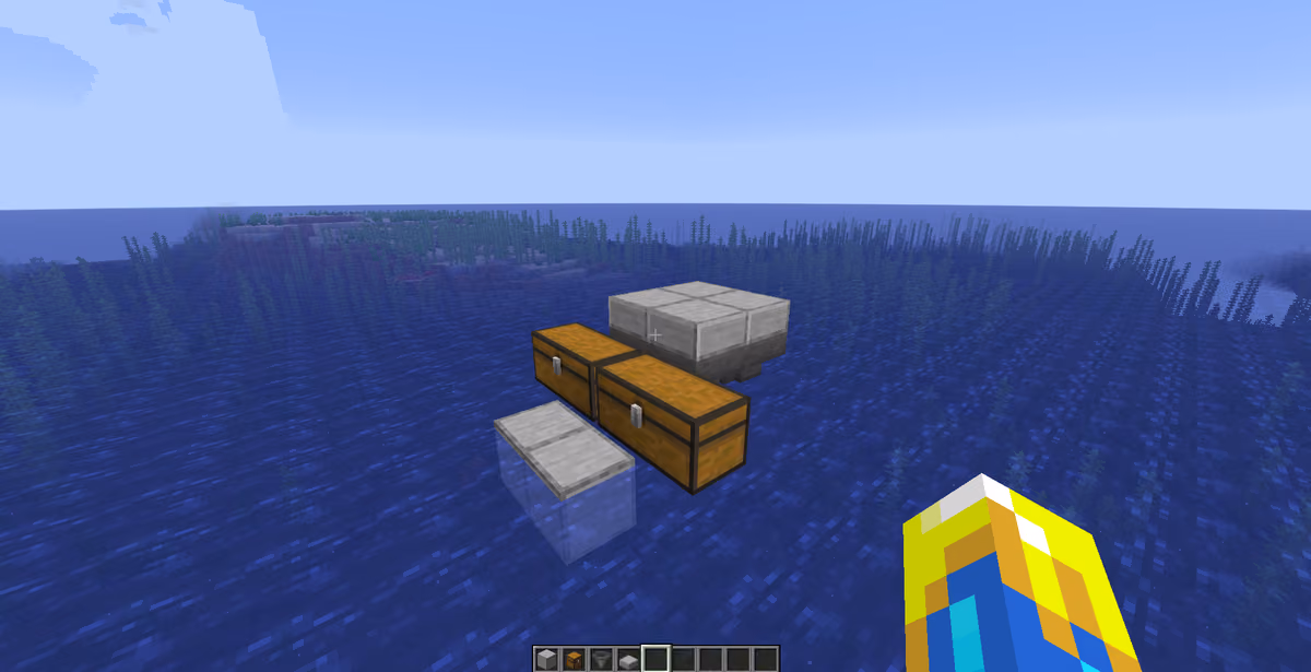 Place two double chests next to each other on the ground or on a prepared platform. Connect 4 hoppers to the back of the…