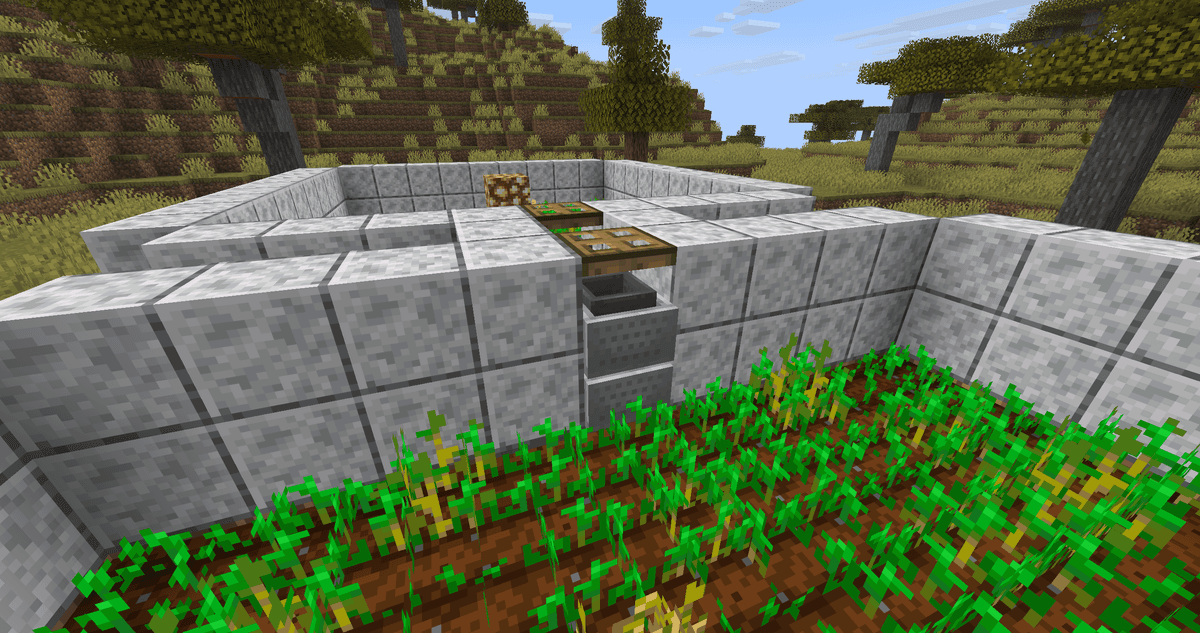 On the central block of each field, place a Rail and put two Minecarts with Hoppers on top of each other. The layout on each…